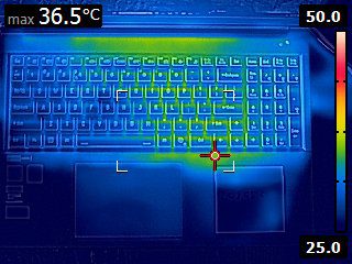 A FLIR image of the keyboard surface of the laptop. The lower third of the image is a dark blue (25 degrees C), and the keyboard area is light blue (31 degrees C). There is a green area on the top edge, radiating from the center of that edge about halfway across the edge. There is also a green spot in the are between the "J" key and the enter key that extends all the way from the top to bottom of the physical keyboard area. There is an indicator which states that the highest temperature is 36.5 degrees celcius.
