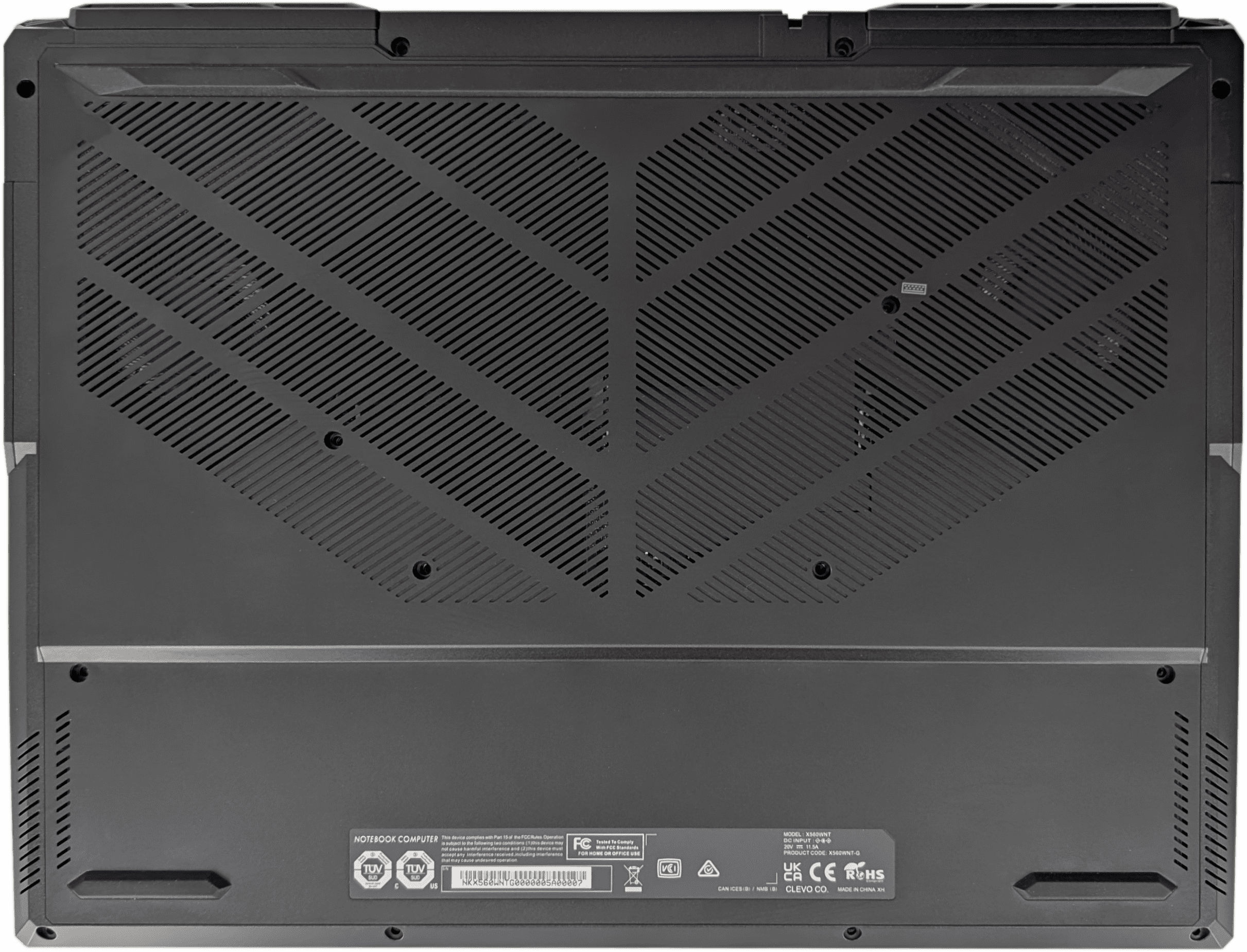 A pciture of the bottom of the Puget Mobile 16". There are 4 screw holes along the edge of the top and bottom, two located 30% up the image about 1" in from the sides, and 4 more roughyl concentric around the center of the laptop.