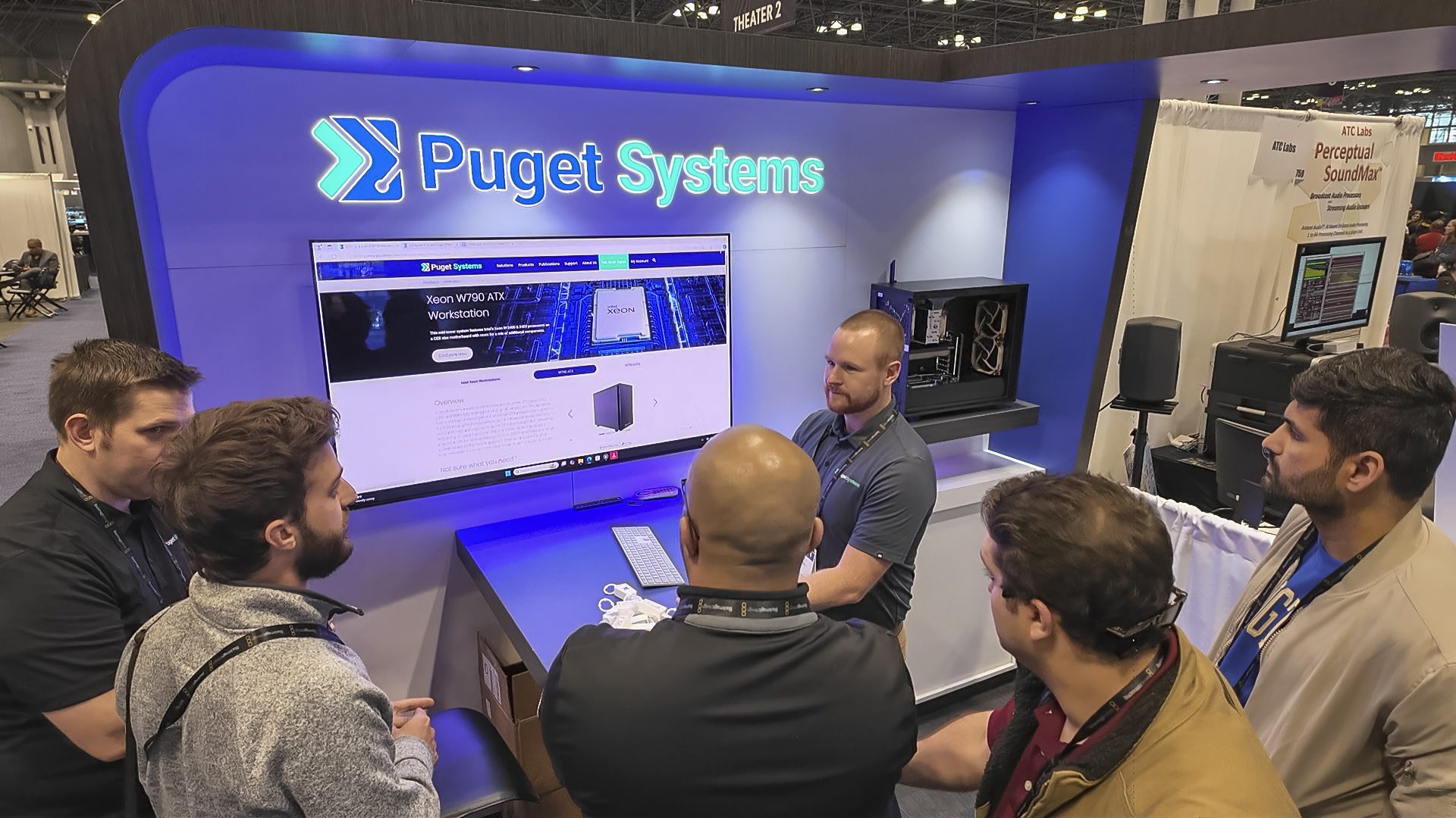 a photo of event attendees at the Puget Systems booth at NAB NY 2024 at the Javits Center in New York City