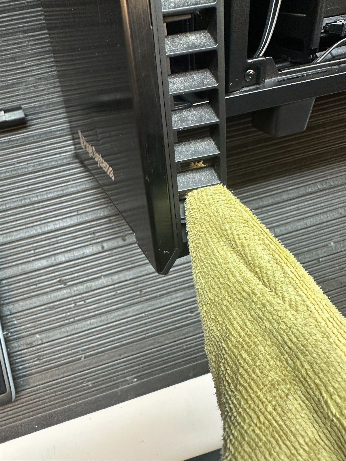 cleaning front slots with microfiber cloth