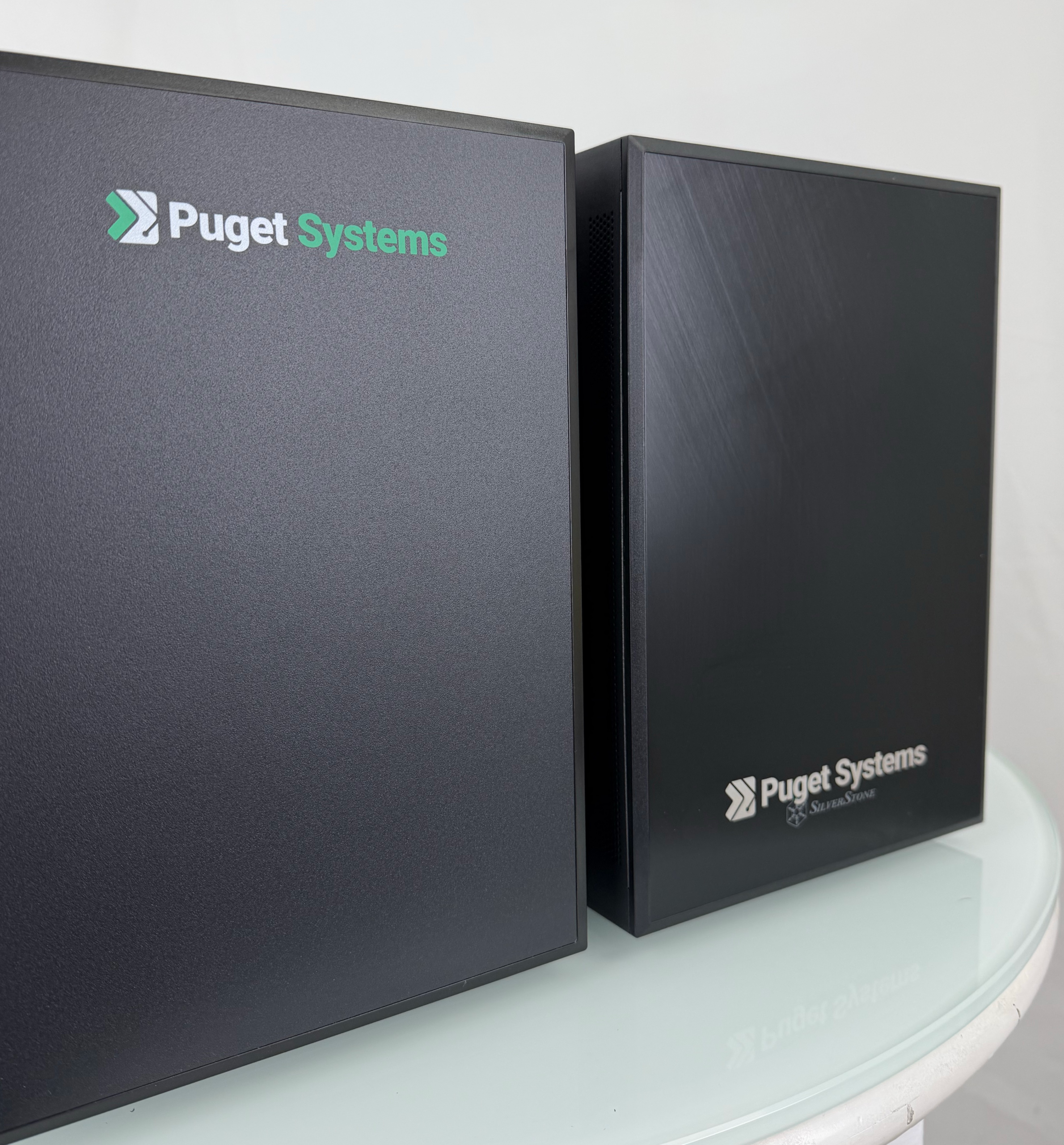 Comparison of the Stock SUGO 17 Front Panel (Right) and the Puget Systems Branded Version (Left)